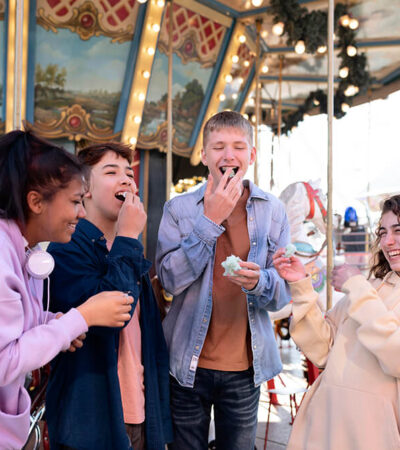 medium-shot-friends-fair medium-shot-friends-fair